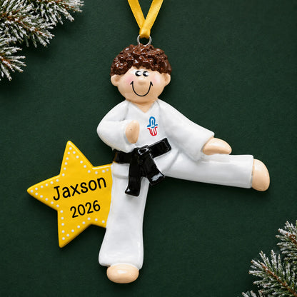 Personalized karate MMA guy christmas ornament on a dark green pine background