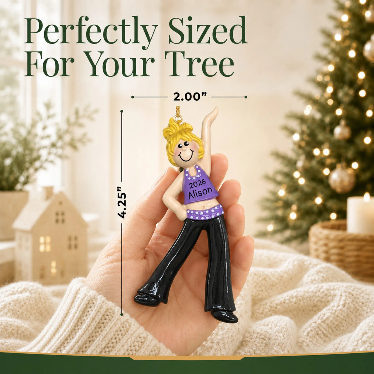Size guide: the personalized blonde dance girl christmas ornament is 2.00 in wide by 4.25 in tall, shown in hand