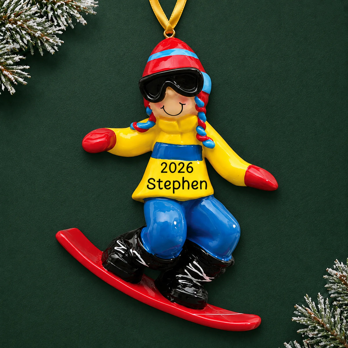 Personalized snowboard guy christmas ornament on a dark green pine background