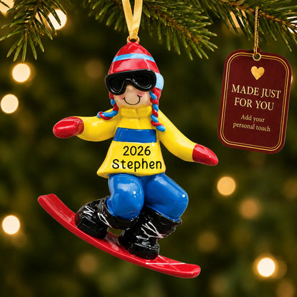 Snowboard guy christmas ornament hanging on a lit Christmas tree with a Made Just For You gift tag