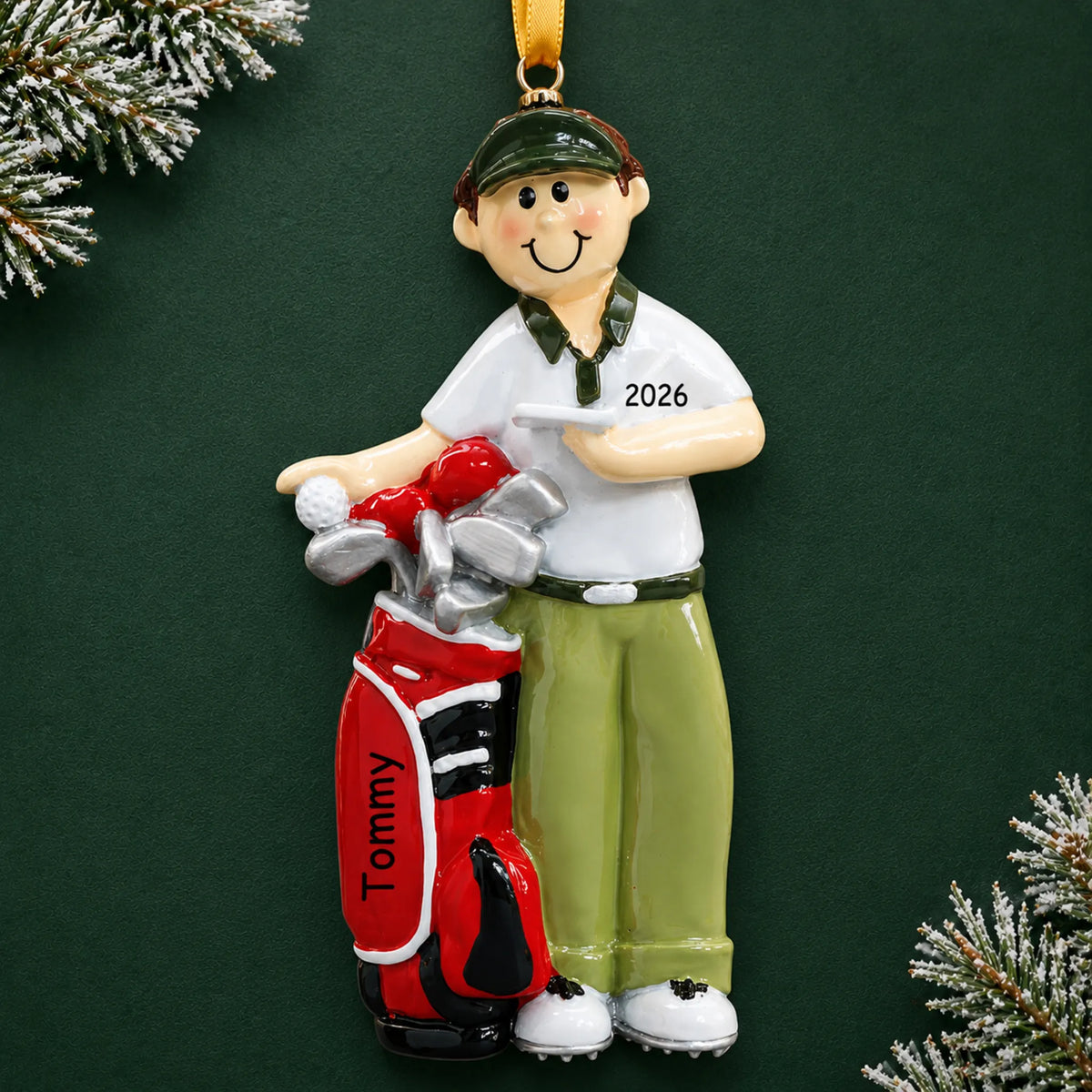 Personalized golfer christmas ornament on a dark green pine background