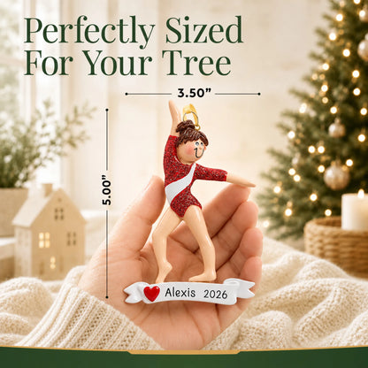 Size guide: the personalized red leotard gymnast christmas ornament is 3.50 in wide by 5.00 in tall, shown in hand