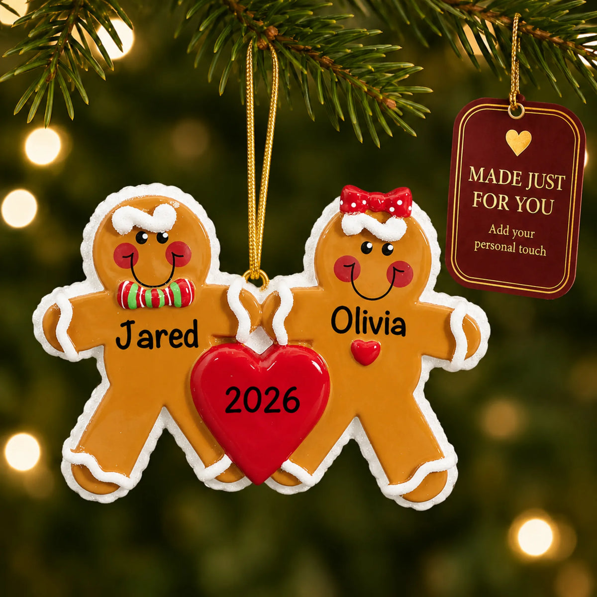 Gingerbread love couple christmas ornament hanging on a lit Christmas tree with a Made Just For You gift tag