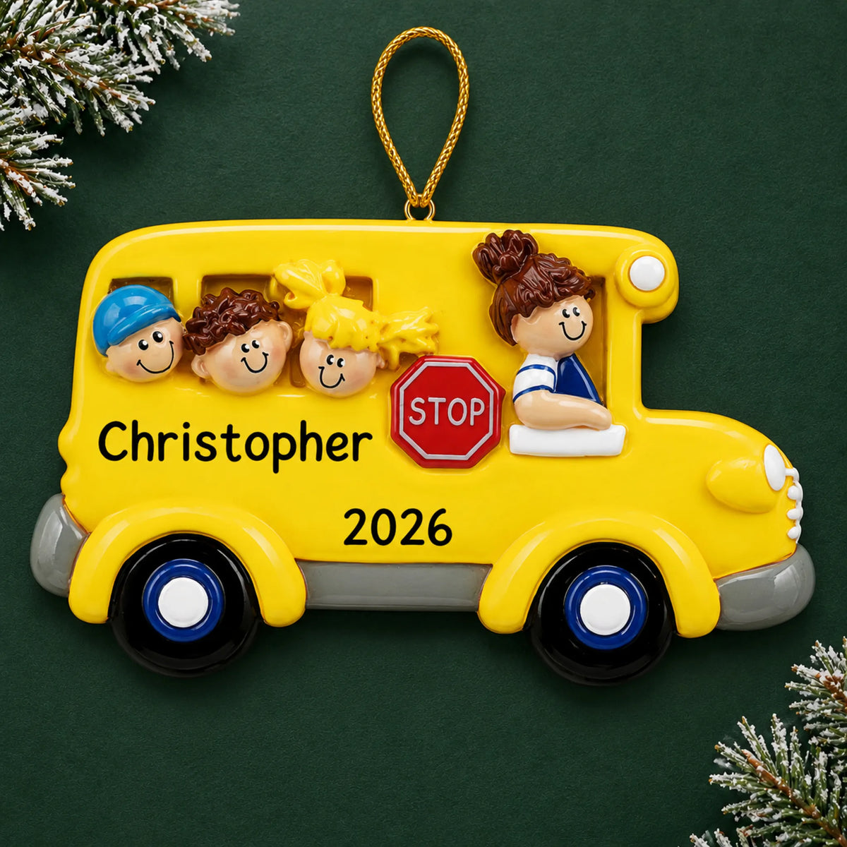Personalized Kids School Bus christmas ornament on a dark green pine background