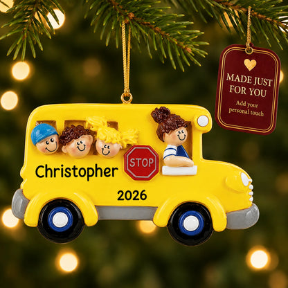 Kids School Bus christmas ornament hanging on a lit Christmas tree with a Made Just For You gift tag