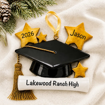 Personalized graduation Christmas ornament with black cap, gold tassel, diploma scroll and gold star name tags on knit