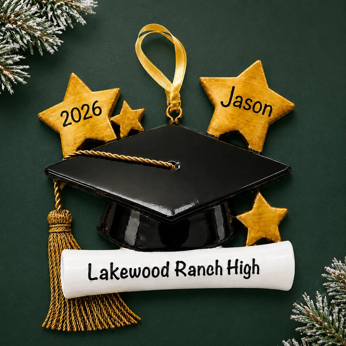 Personalized graduation Christmas ornament with cap, diploma scroll and star name tags on a festive green backdrop