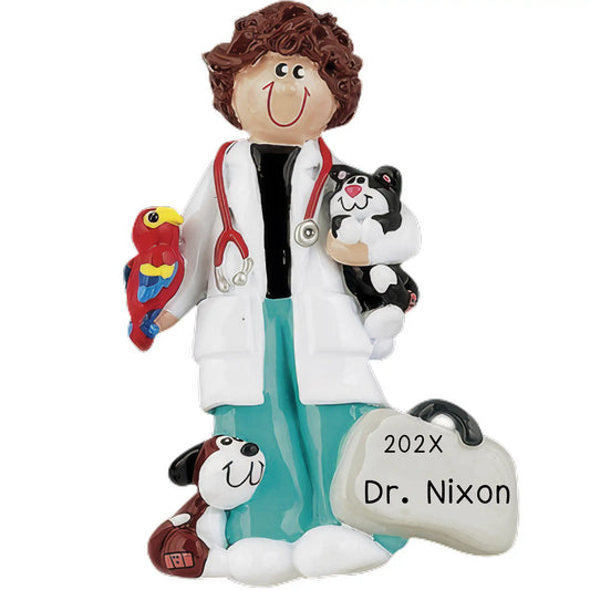 A personalized ornament featuring a smiling female veterinarian character holding a stethoscope and a cat. The background is white, and there is a tag with the name 'Dr. Nixon'.
