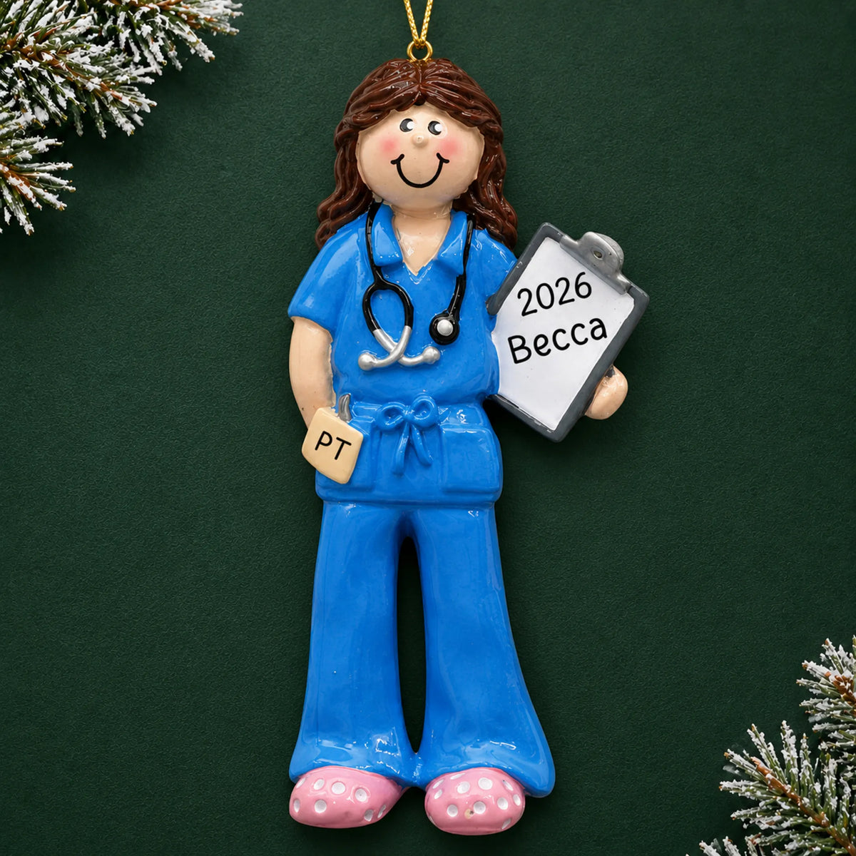 Personalized physical therapist christmas ornament on a dark green pine background