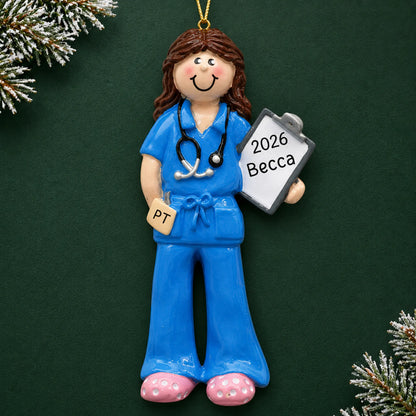 Personalized physical therapist christmas ornament on a dark green pine background