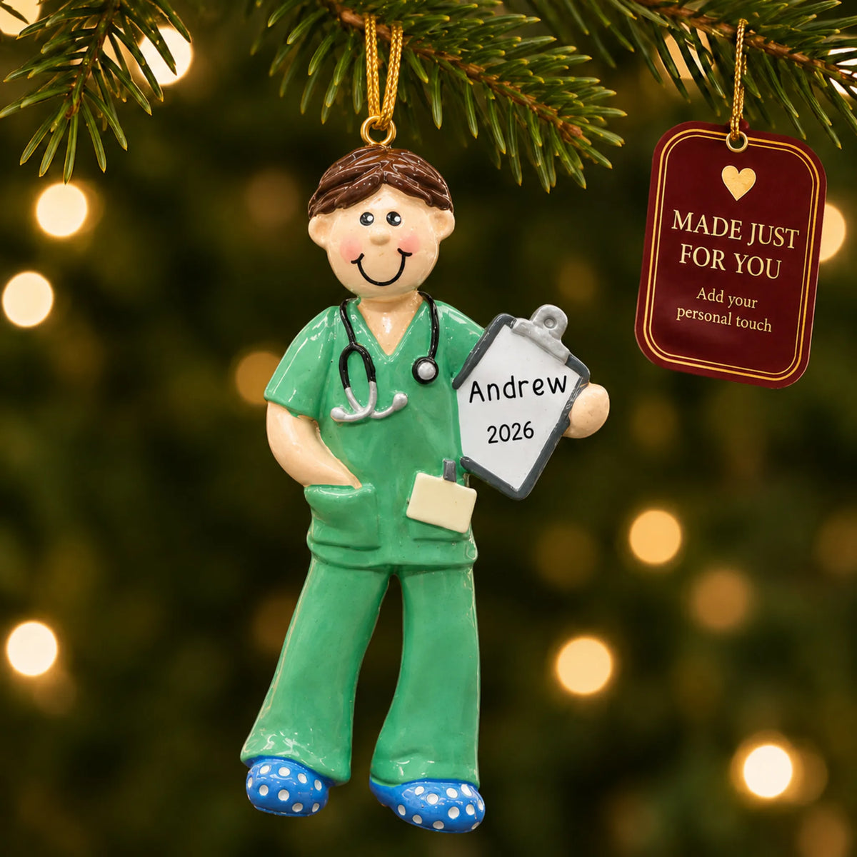 Scrubs medical professional christmas ornament hanging on a lit Christmas tree with a Made Just For You gift tag