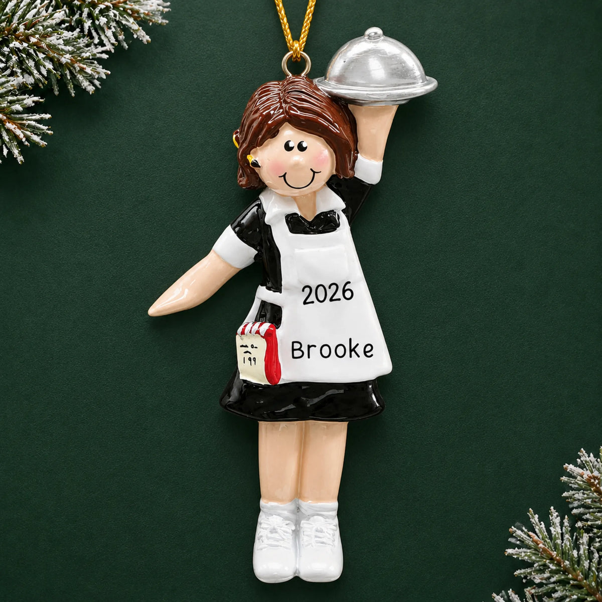 Personalized waitress server christmas ornament on a dark green pine background