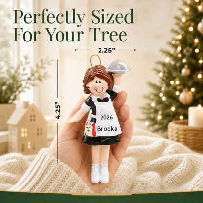 Size guide: the personalized waitress server christmas ornament is 2.25 in wide by 4.25 in tall, shown in hand