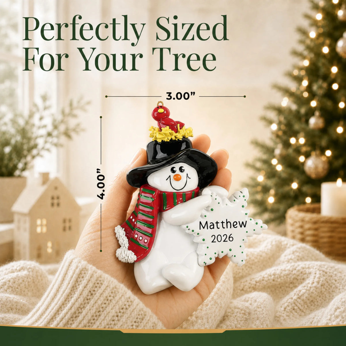Size guide: the personalized Birdsnest Snowman christmas ornament is 3.00 in wide by 4.00 in tall, shown in hand