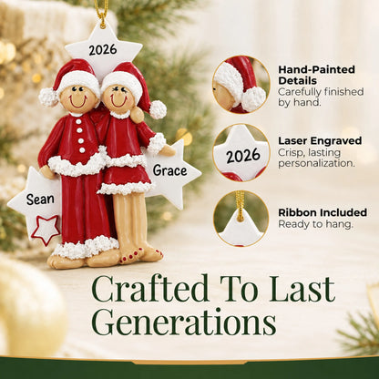 Hand-painted details and laser engraved personalization on the christmas pajama couple ornament, ribbon included