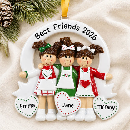 Personalized friends / sisters 3 christmas ornament laid on a soft white knit blanket