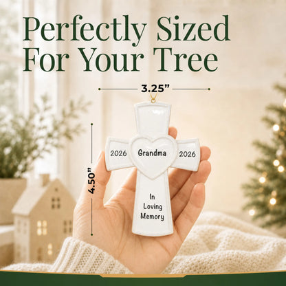 Size guide: the personalized White Cross Memorial christmas ornament is 3.25 in wide by 4.50 in tall, shown in hand