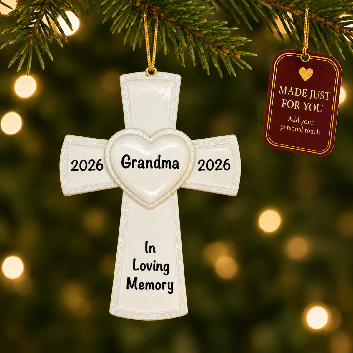 White Cross Memorial christmas ornament hanging on a lit Christmas tree with a Made Just For You gift tag