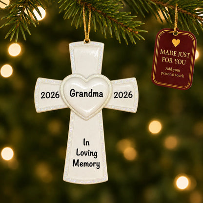 White Cross Memorial christmas ornament hanging on a lit Christmas tree with a Made Just For You gift tag