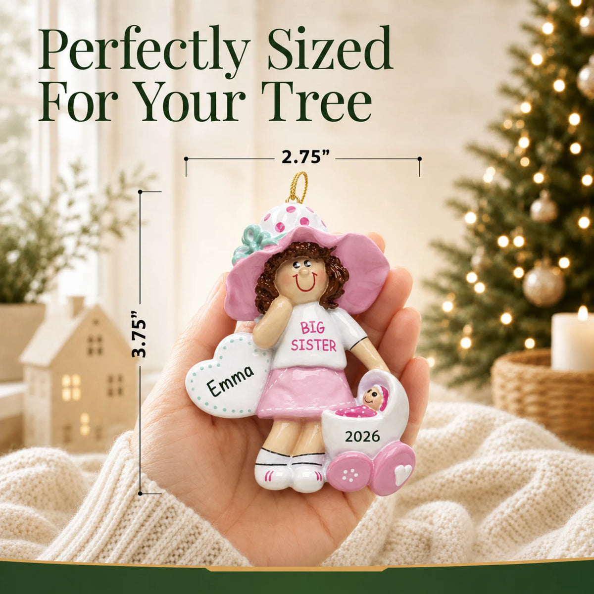 Size guide: the personalized brunette big sister christmas ornament is 2.75 in wide by 3.75 in tall, shown in hand