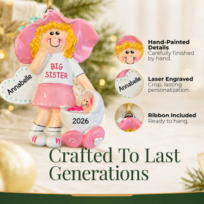 Hand-painted details and laser engraved personalization on the blonde big sister christmas ornament, ribbon included