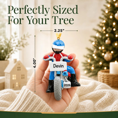 Size guide: the personalized dirt bike rider christmas ornament shown in hand next to a Christmas tree