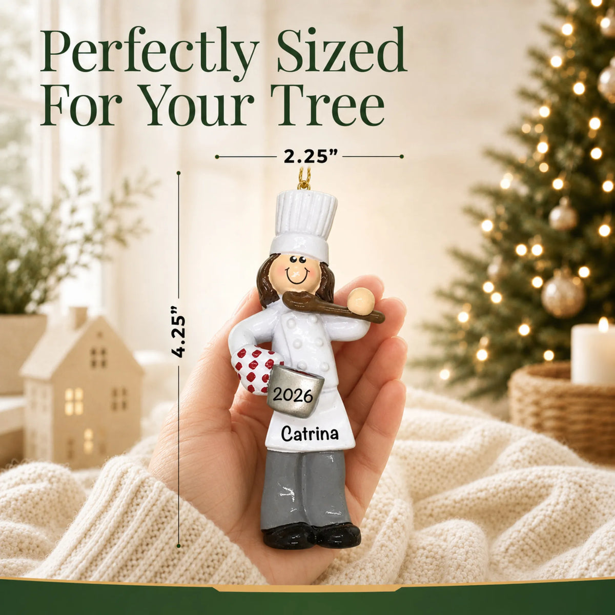 Size guide: the personalized chef girl christmas ornament is 2.25 in wide by 4.25 in tall, shown in hand