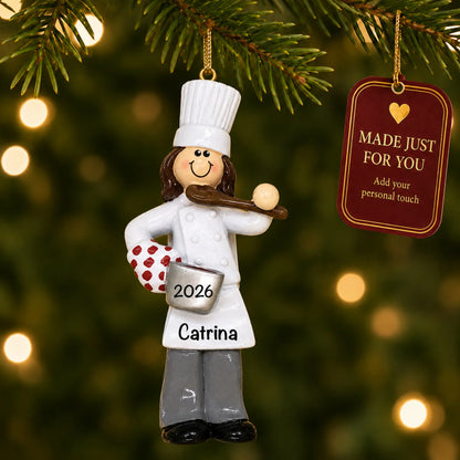 Chef girl christmas ornament hanging on a lit Christmas tree with a Made Just For You gift tag