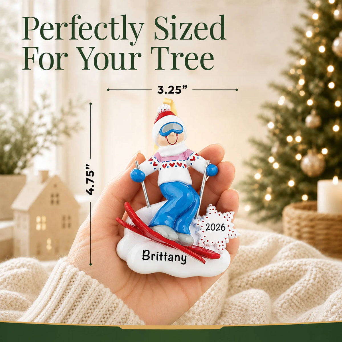 Size guide: the personalized ski girl christmas ornament is 3.25 in wide by 4.75 in tall, shown in hand