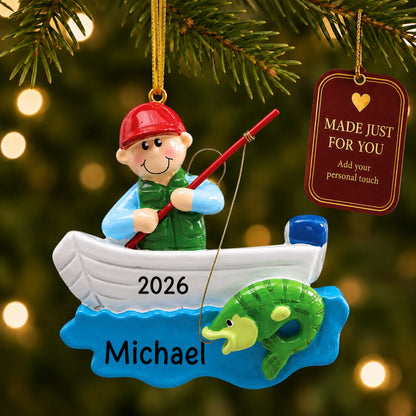 Fisherman in boat christmas ornament hanging on a lit Christmas tree with a Made Just For You gift tag