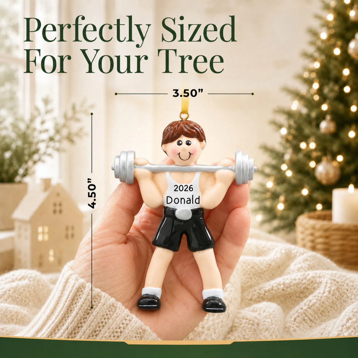 Size guide: the personalized weightlifter christmas ornament is 3.50 in wide by 4.50 in tall, shown in hand