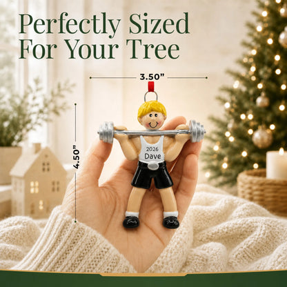 Size guide: the personalized blonde weightlifter christmas ornament is 3.50 in wide by 4.50 in tall, shown in hand