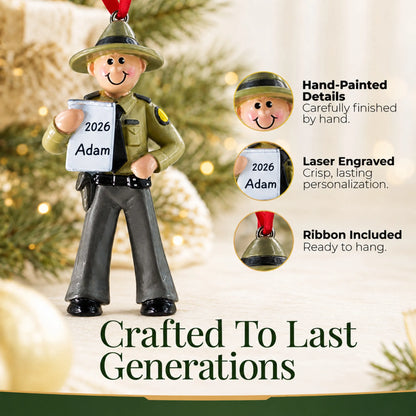 Hand-painted details and laser engraved personalization on the state trooper christmas ornament, ribbon included
