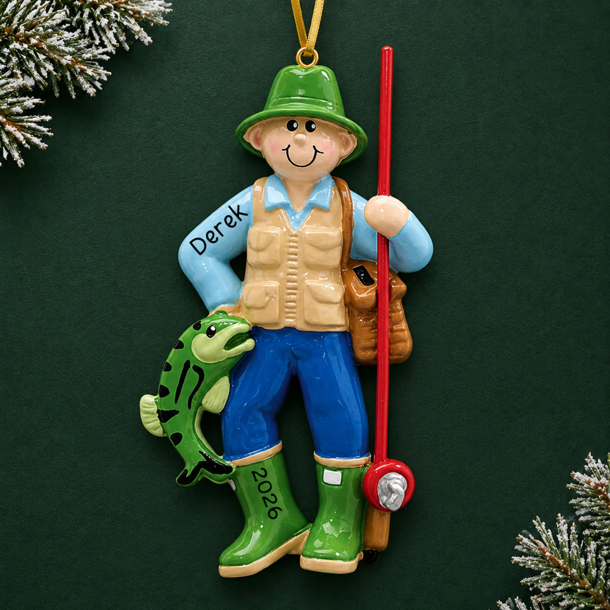 Personalized fly fisherman christmas ornament on a dark green pine background