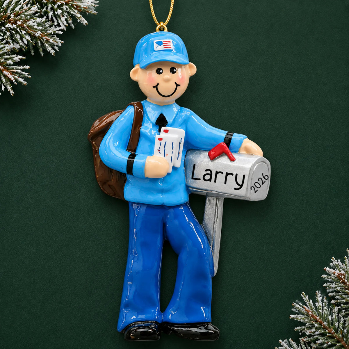 Personalized postal mail carrier christmas ornament on a dark green pine background