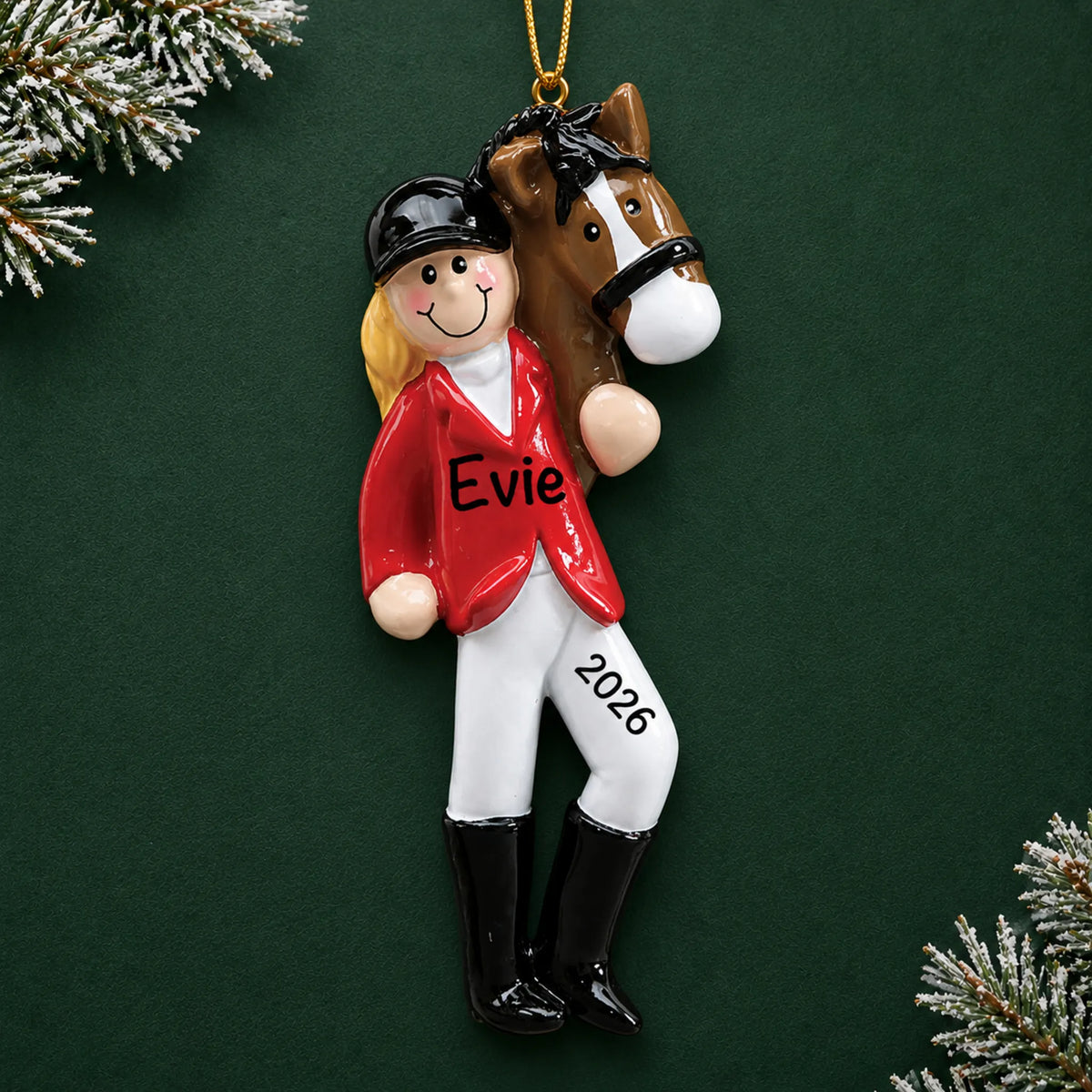 Personalized blonde horse riding girl christmas ornament on a dark green pine background