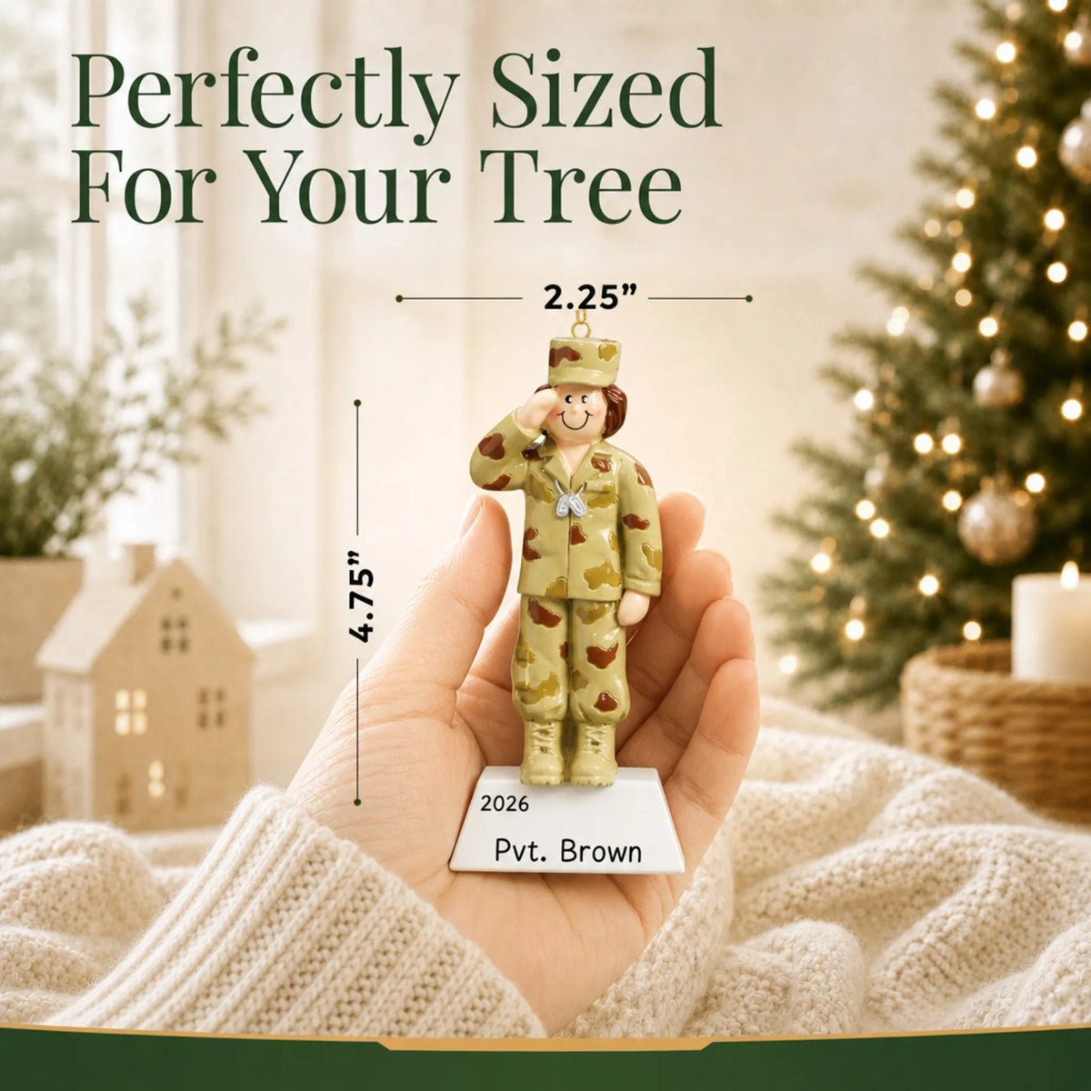 Personalized US Army girl Christmas ornament held in hand to show its size on the tree