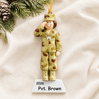 Personalized US Army girl Christmas ornament shown on a soft white blanket