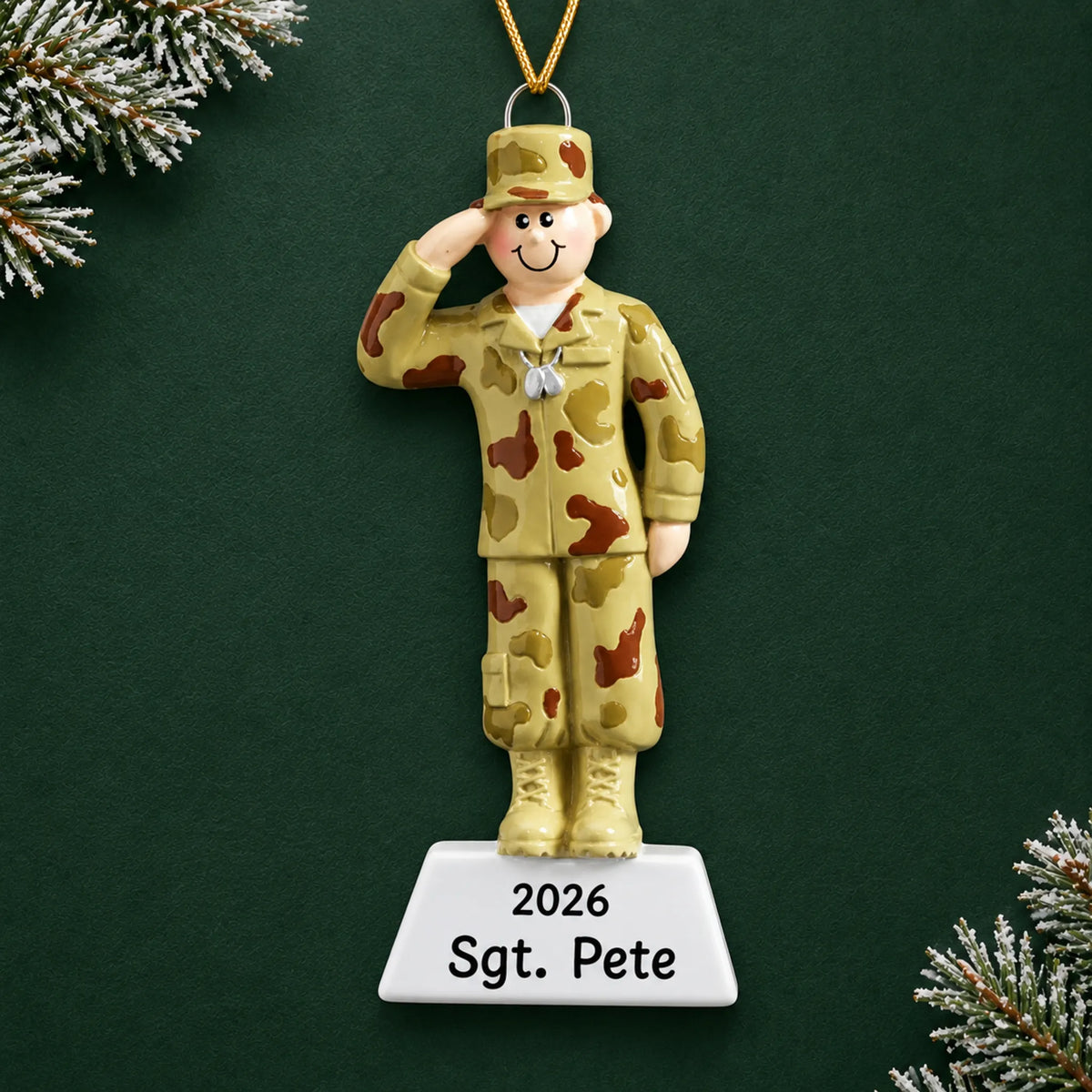 Personalized Army soldier Christmas ornament with name and year, shown on a green holiday background