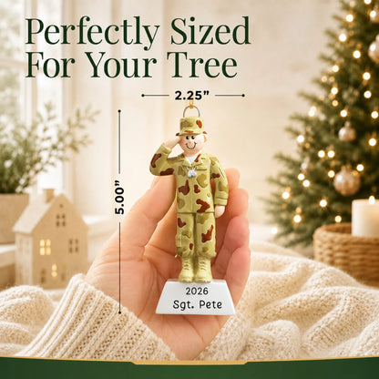 Personalized Army soldier Christmas ornament held in hand to show its size on the tree