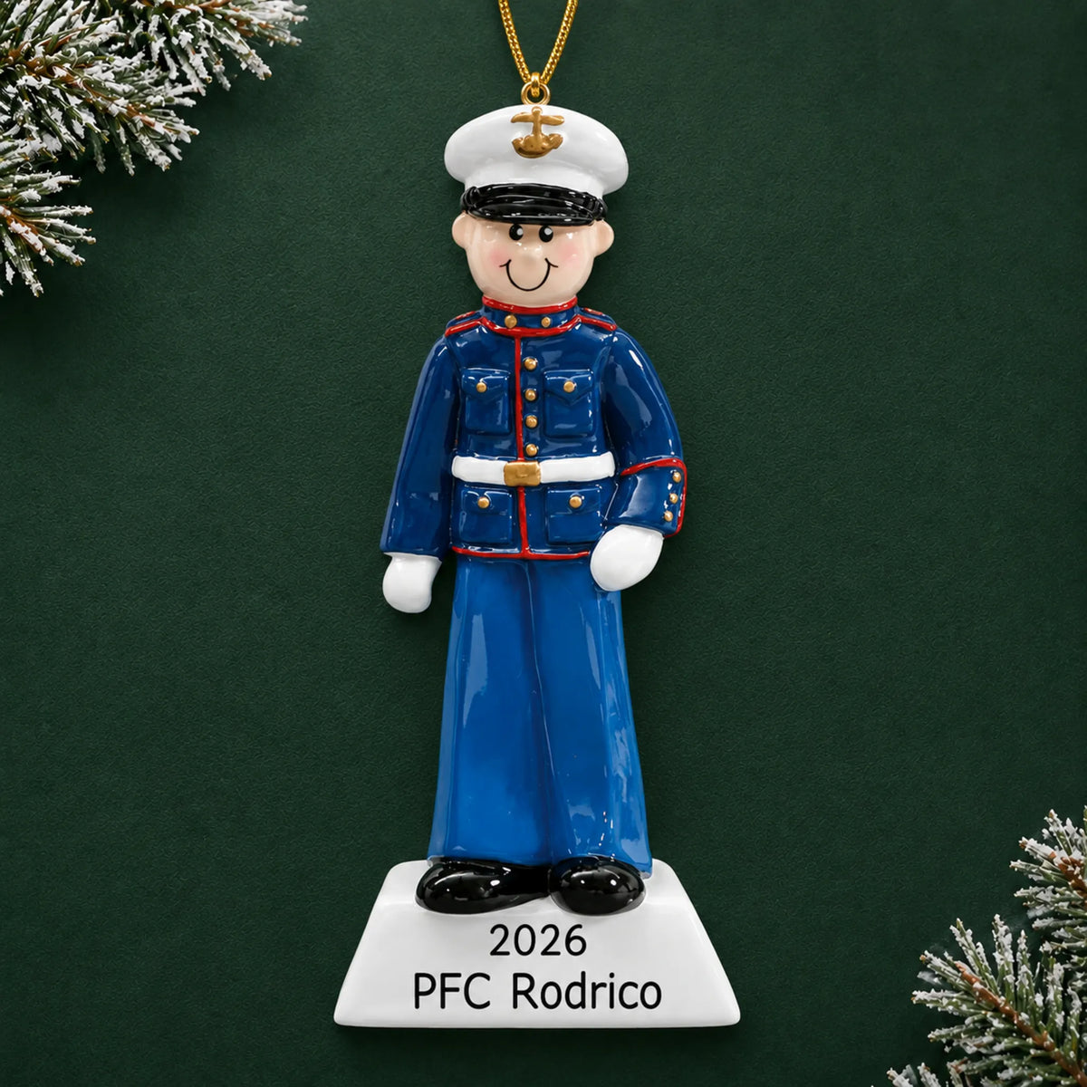 Personalized US Marine Christmas ornament with name and year, shown on a green holiday background