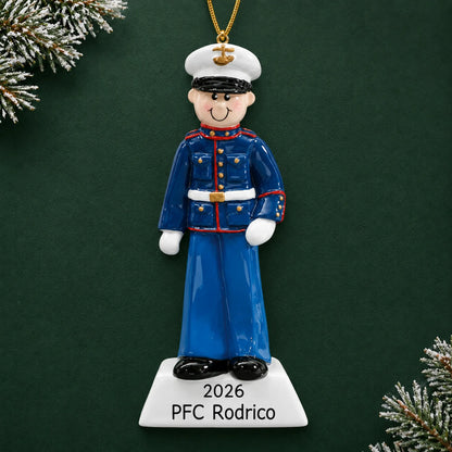 Personalized US Marine Christmas ornament with name and year, shown on a green holiday background