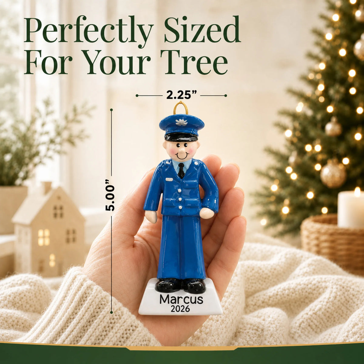 Personalized US Air Force airman Christmas ornament held in hand to show its size on the tree