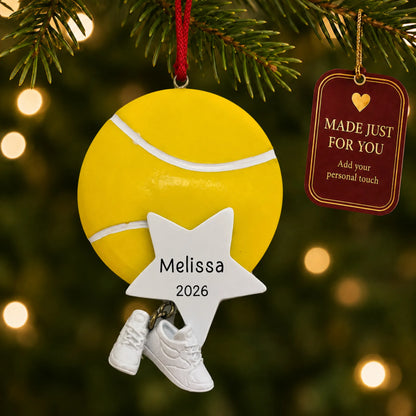 Tennis star christmas ornament hanging on a lit Christmas tree with a Made Just For You gift tag