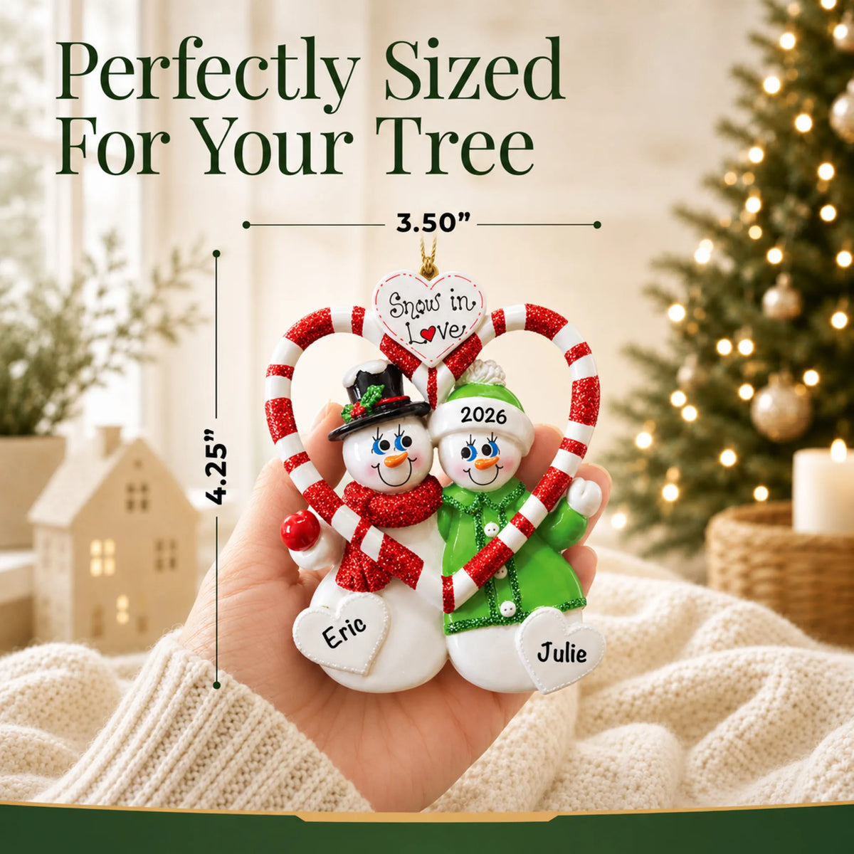 Size guide: the personalized candy cane love couple christmas ornament is 3.50 in wide by 4.25 in tall, shown in hand