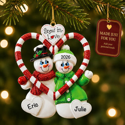 Candy cane love couple christmas ornament hanging on a lit Christmas tree with a Made Just For You gift tag