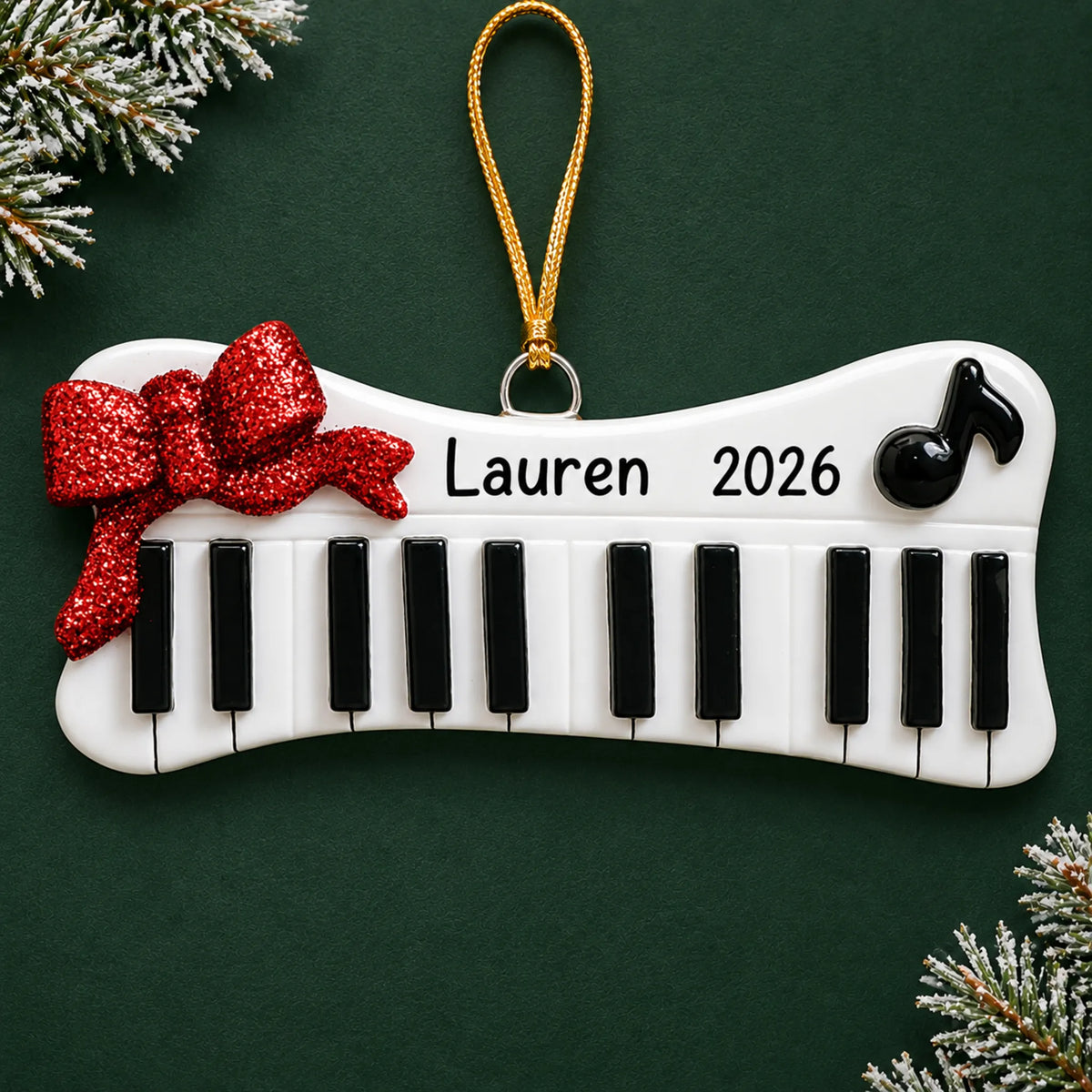 Personalized keyboard christmas ornament on a dark green pine background