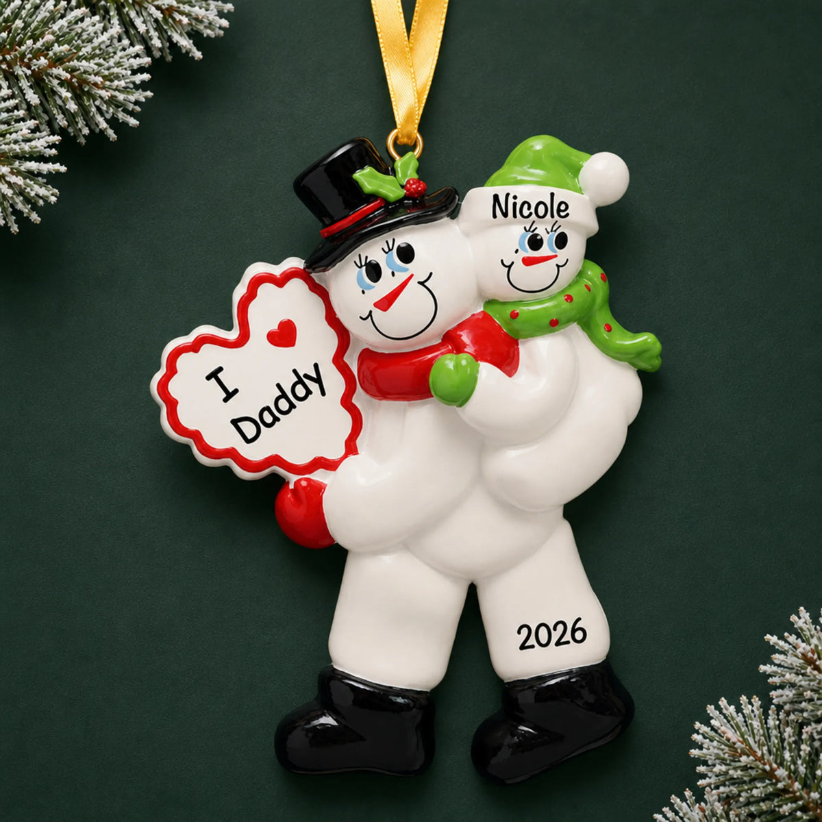 Personalized i love daddy christmas ornament on a dark green pine background