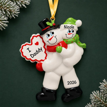 Personalized i love daddy christmas ornament on a dark green pine background