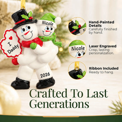 Hand-painted details and laser engraved personalization on the i love daddy christmas ornament, ribbon included